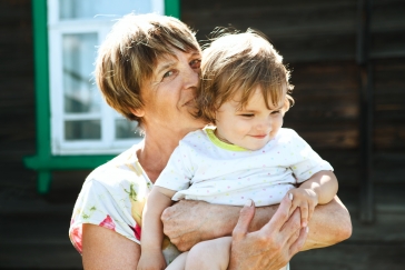 grandmother holding child