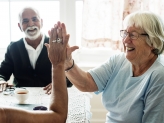 elderly woman celebrating