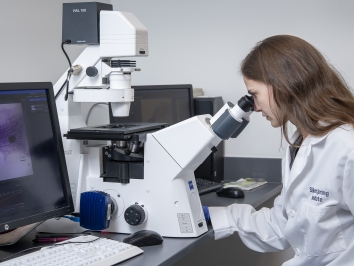 scientist studying breast cancer