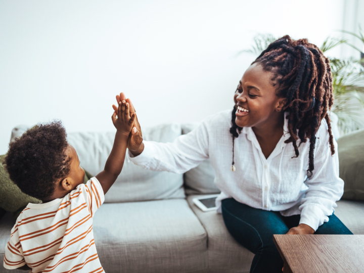mother and son on couch